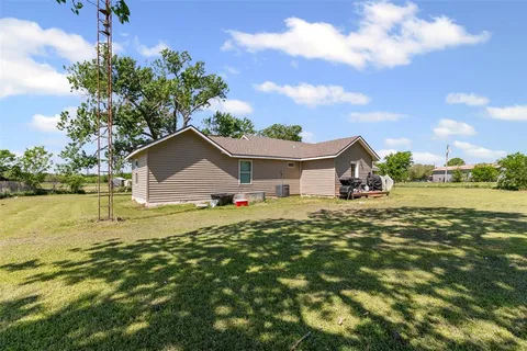a house view with a garden space
