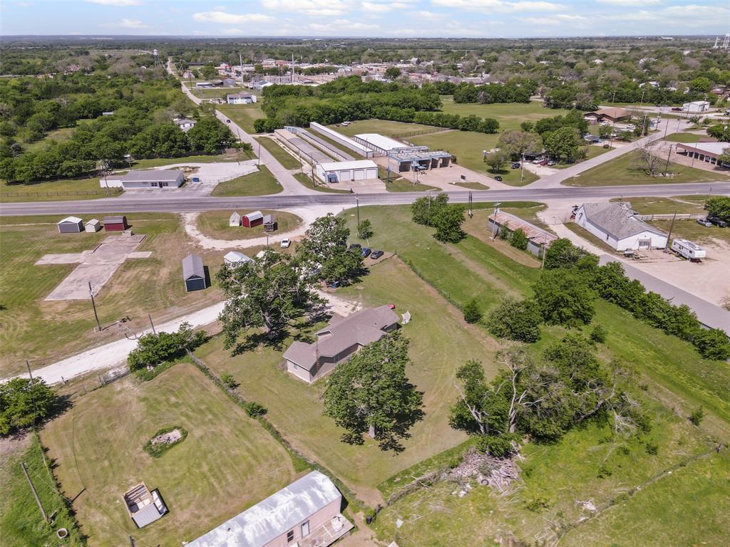 105 South Lavaca Street Whitney, TX 76692 - Photo 38 of 40 an aerial view of a city with lots of residential buildings
