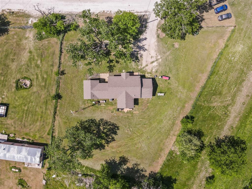 105 South Lavaca Street Whitney, TX 76692 - Photo 40 of 40 an aerial view of a house with a yard