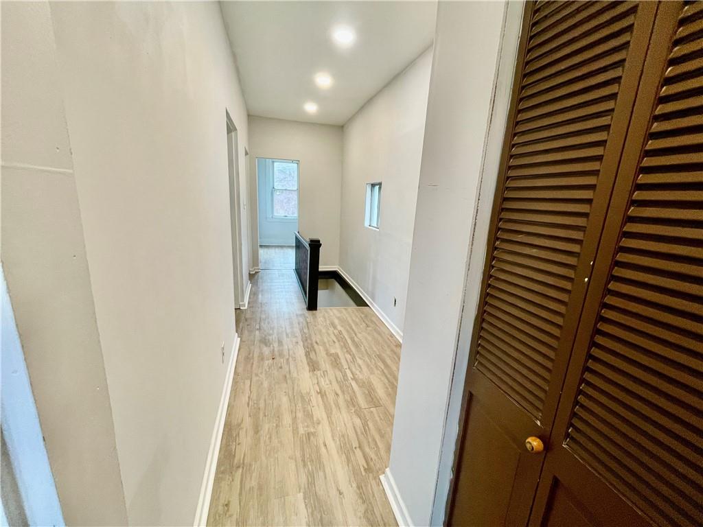 141 Overbeck Street Pittsburgh, PA 15212 - Photo 14 of 29 a view of hallway with wooden floor