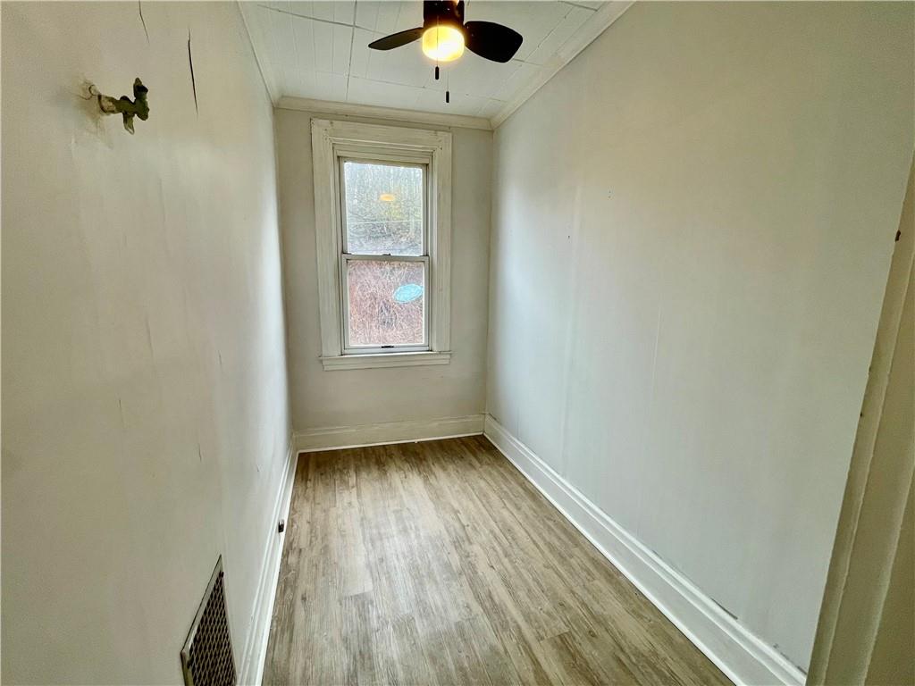 141 Overbeck Street Pittsburgh, PA 15212 - Photo 17 of 29 an empty room with a window