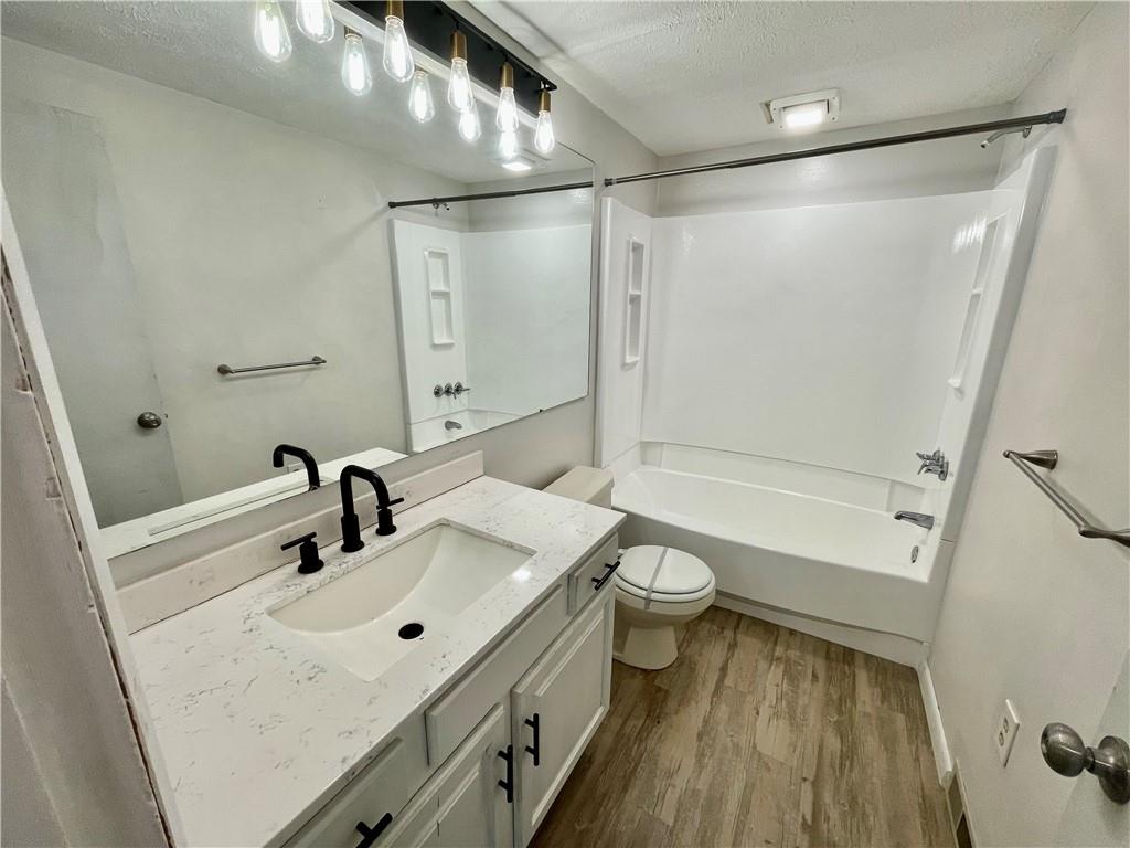 141 Overbeck Street Pittsburgh, PA 15212 - Photo 18 of 29 a bathroom with a sink a toilet and shower