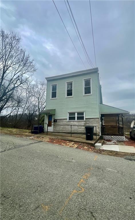 141 Overbeck Street Pittsburgh, PA 15212 - Photo 2 of 29 a view of a house with backyard and sitting area