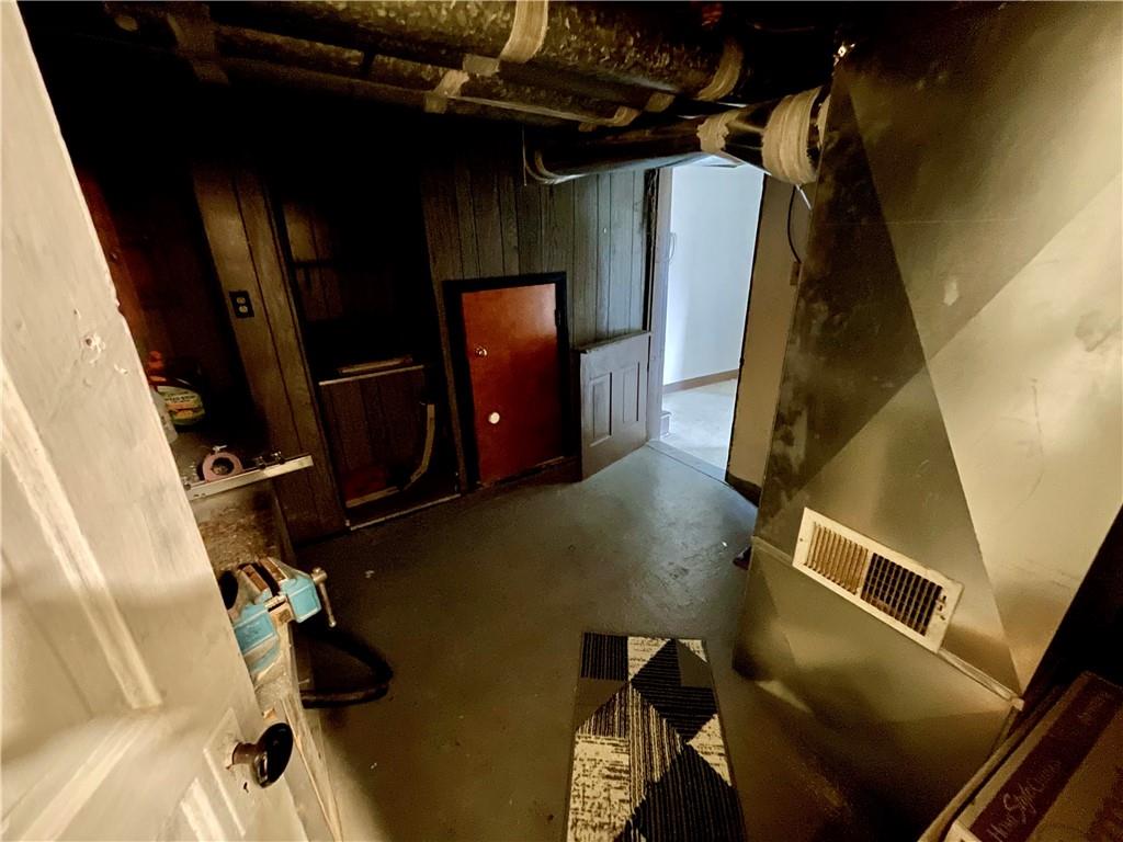 141 Overbeck Street Pittsburgh, PA 15212 - Photo 24 of 29 a view of walk in closet with clothes and shoes