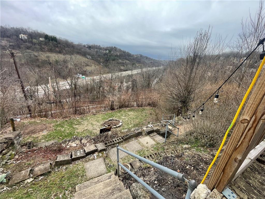 141 Overbeck Street Pittsburgh, PA 15212 - Photo 26 of 29 a view of a yard with wooden fence