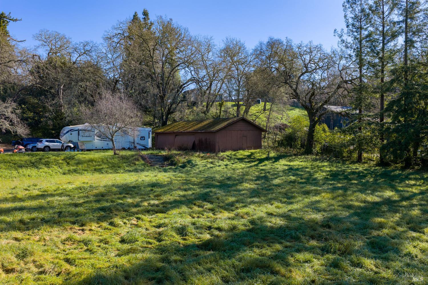 8877 Donald Street Sebastopol, CA 95472 - Photo 24 of 55 a view of a house with a yard
