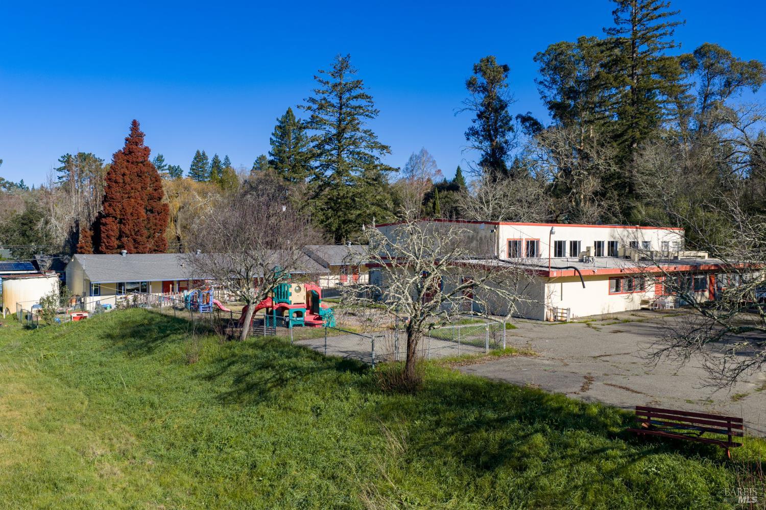 8877 Donald Street Sebastopol, CA 95472 - Photo 27 of 55 a view of a town with barn and large trees