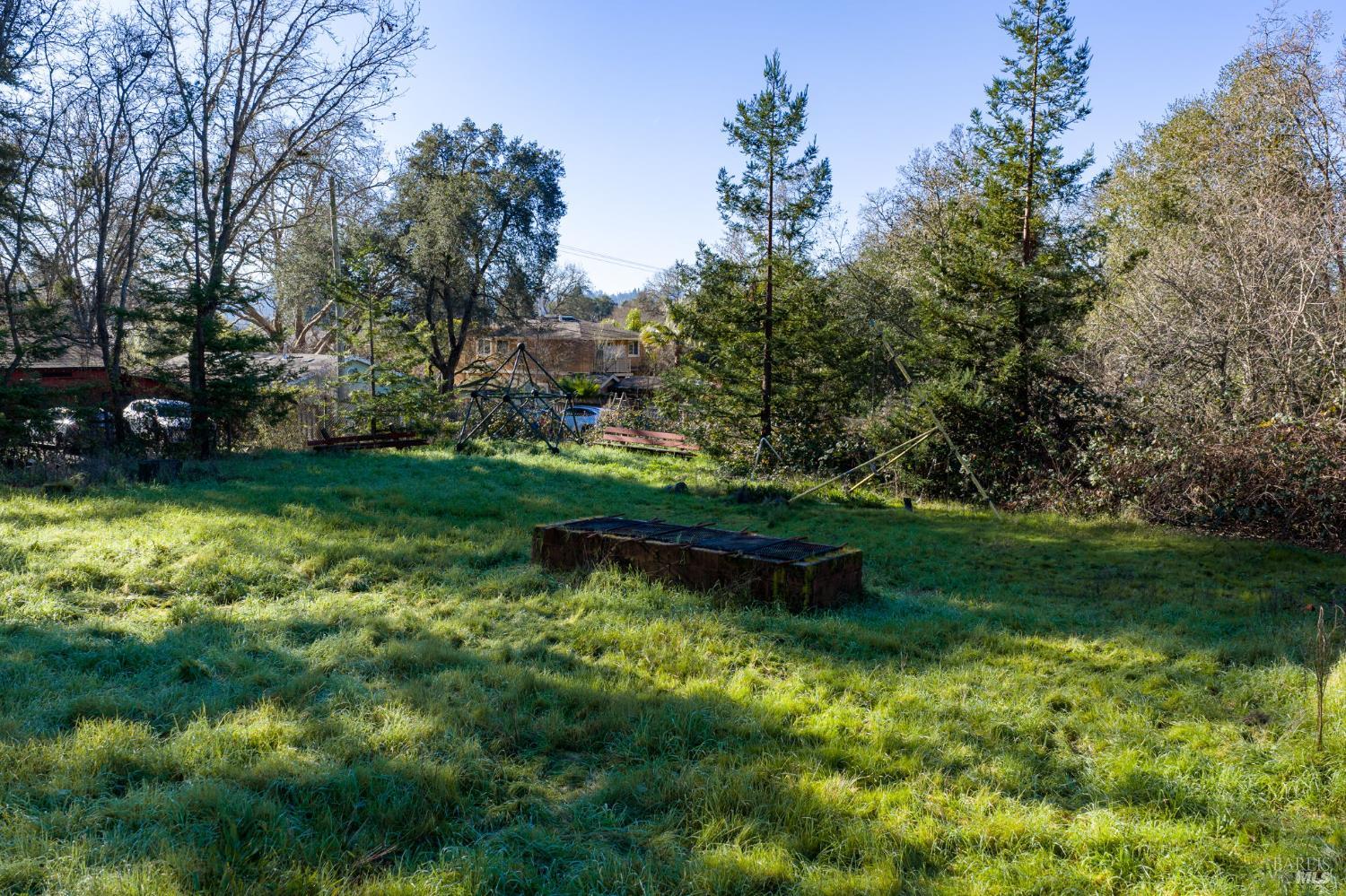 8877 Donald Street Sebastopol, CA 95472 - Photo 30 of 55 a view of a garden with a bench