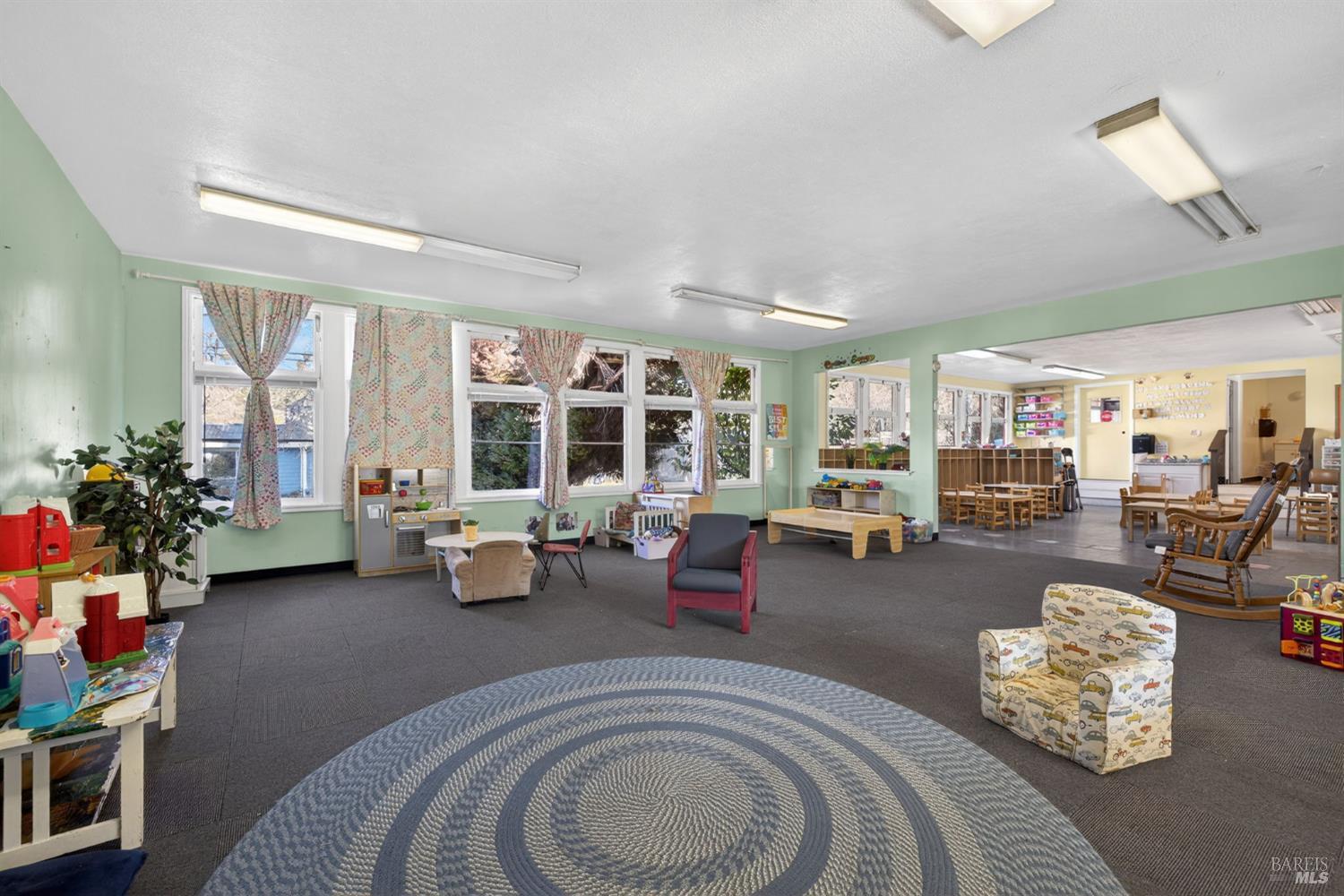 8877 Donald Street Sebastopol, CA 95472 - Photo 41 of 55 a living room with furniture and floor to ceiling window