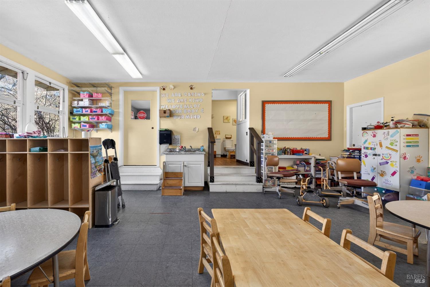8877 Donald Street Sebastopol, CA 95472 - Photo 48 of 55 a living room with furniture a rug and white walls