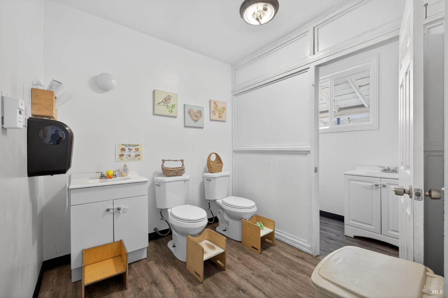 8877 Donald Street Sebastopol, CA 95472 - Photo 52 of 55 a bathroom with a toilet a sink and mirror