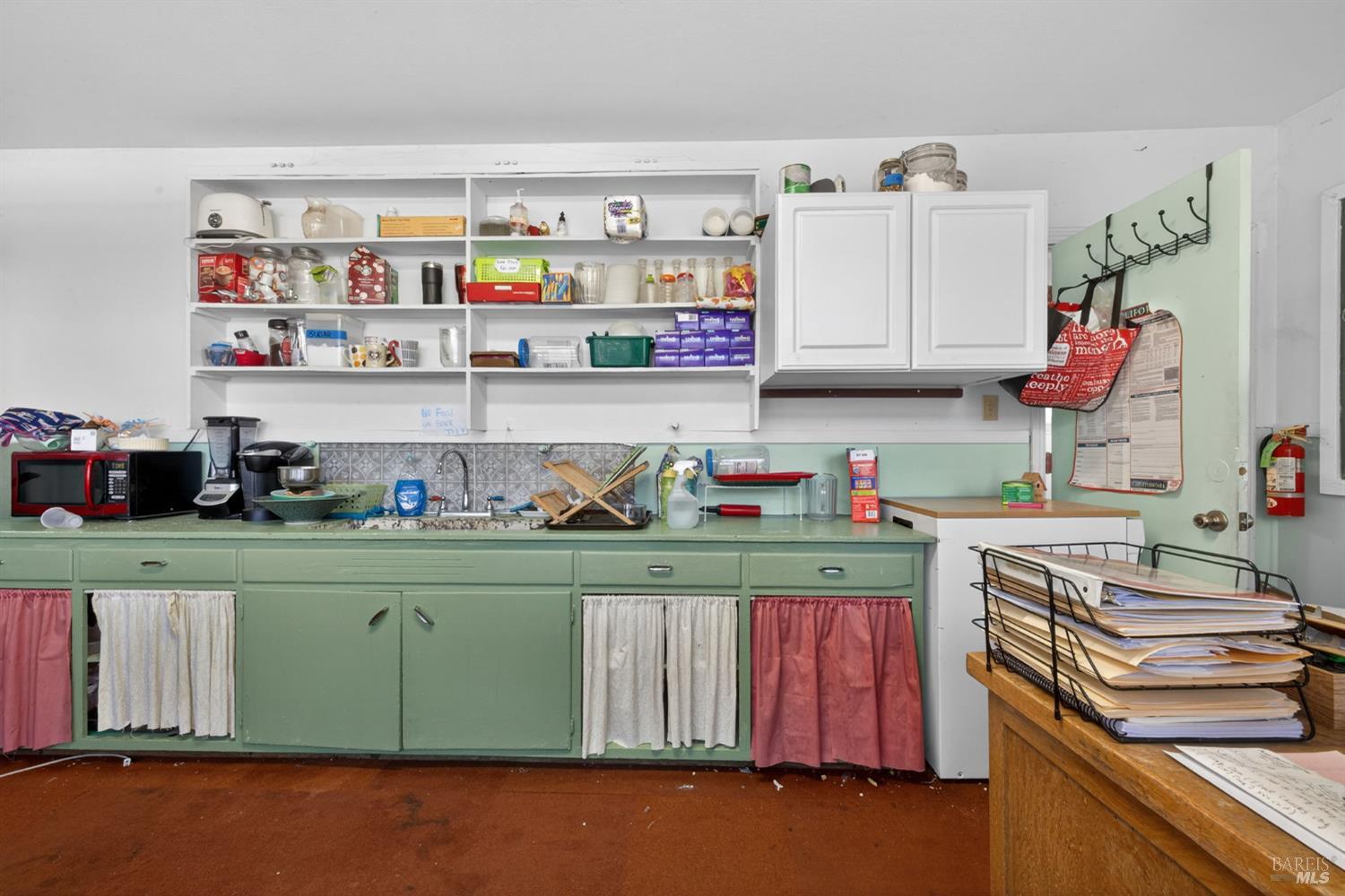 8877 Donald Street Sebastopol, CA 95472 - Photo 54 of 55 a kitchen with stainless steel appliances granite countertop a stove and a refrigerator