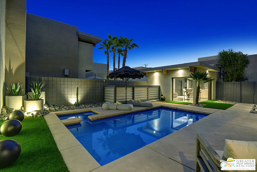 1508 East Baristo Road Palm Springs, CA 92262 - Photo 2 of 62 a view of swimming pool with outdoor seating