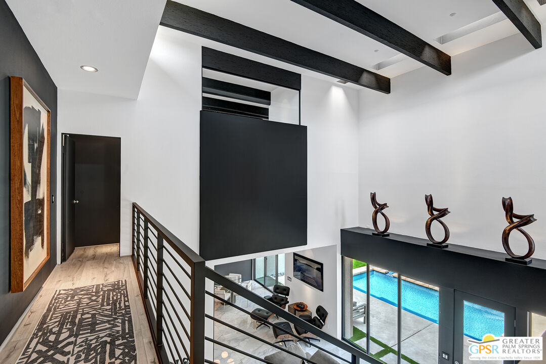 1508 East Baristo Road Palm Springs, CA 92262 - Photo 40 of 62 a view of a hallway with seating area