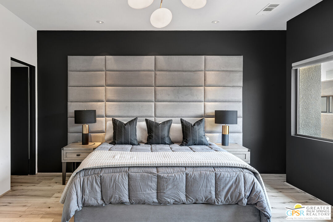 1508 East Baristo Road Palm Springs, CA 92262 - Photo 48 of 62 a bedroom with a bed and a window