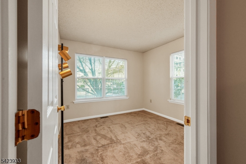159 West Market Street Newark, NJ 07103 - Photo 14 of 18 an empty room with windows