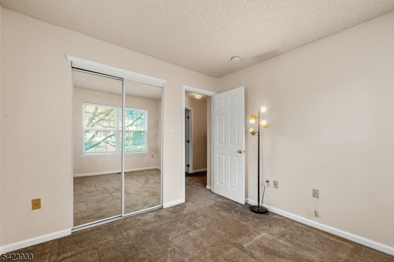 159 West Market Street Newark, NJ 07103 - Photo 15 of 18 an empty room with sliding glass door