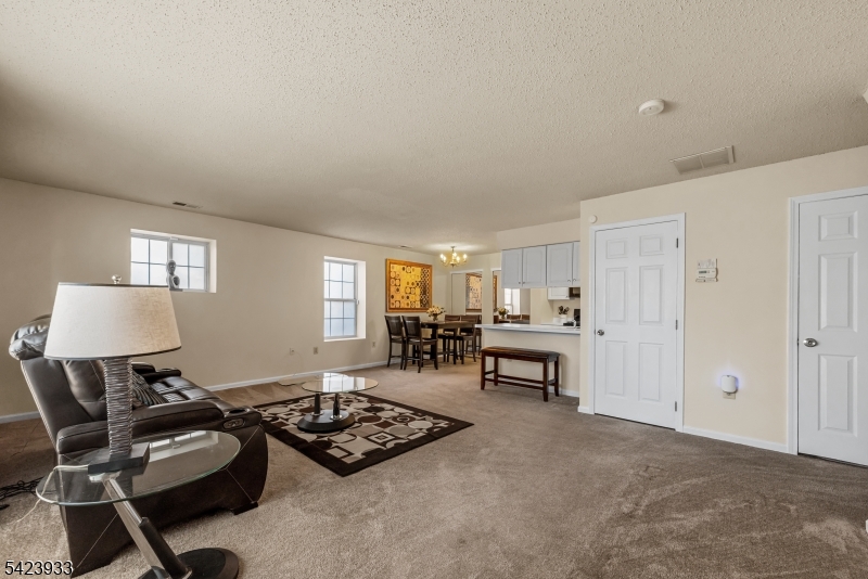 159 West Market Street Newark, NJ 07103 - Photo 2 of 18 a living room with furniture and a window