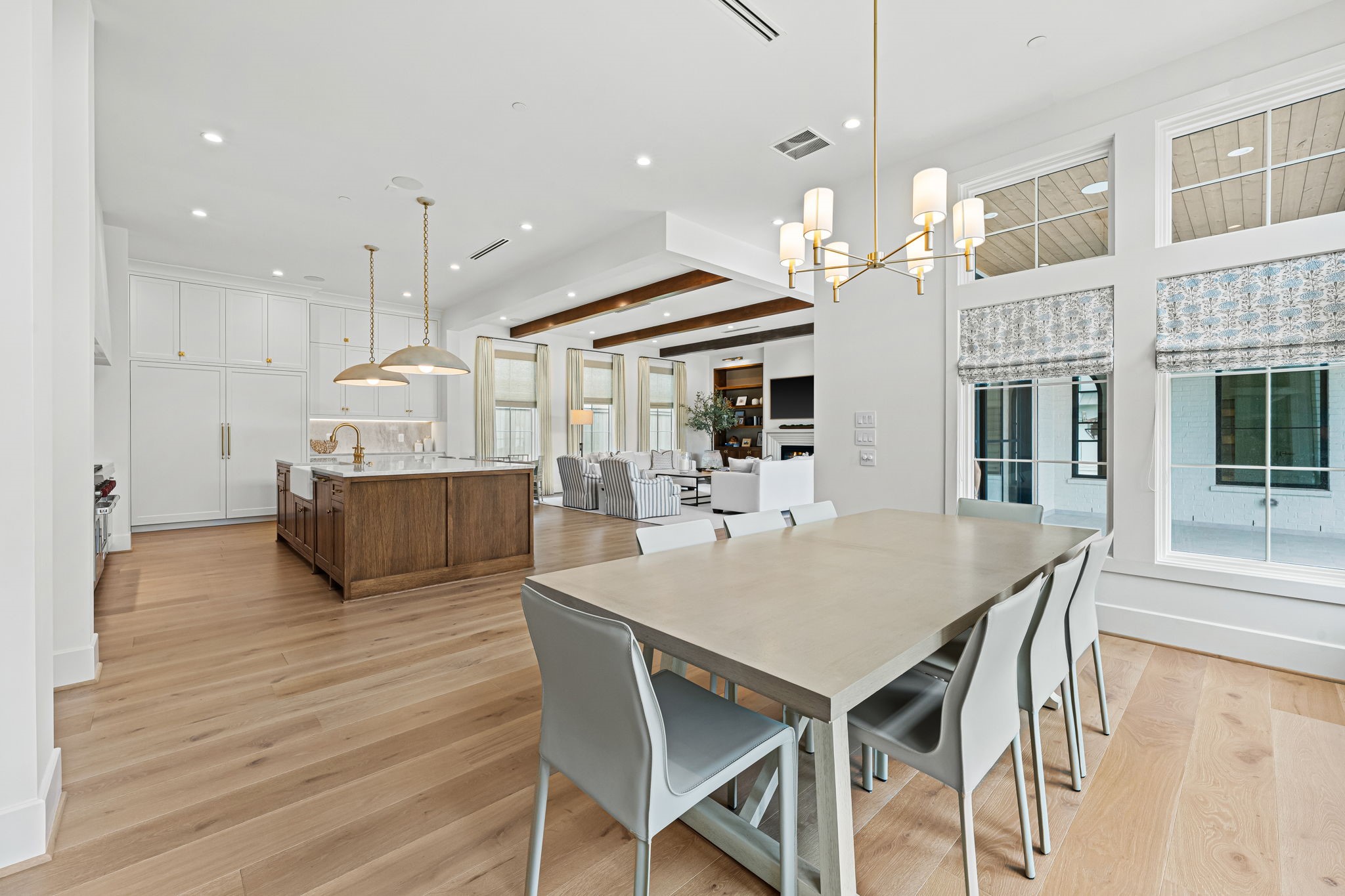 8722 Lupton Lane Houston, TX 77055 - Photo 16 of 44 a view of a dining room with furniture and wooden floor