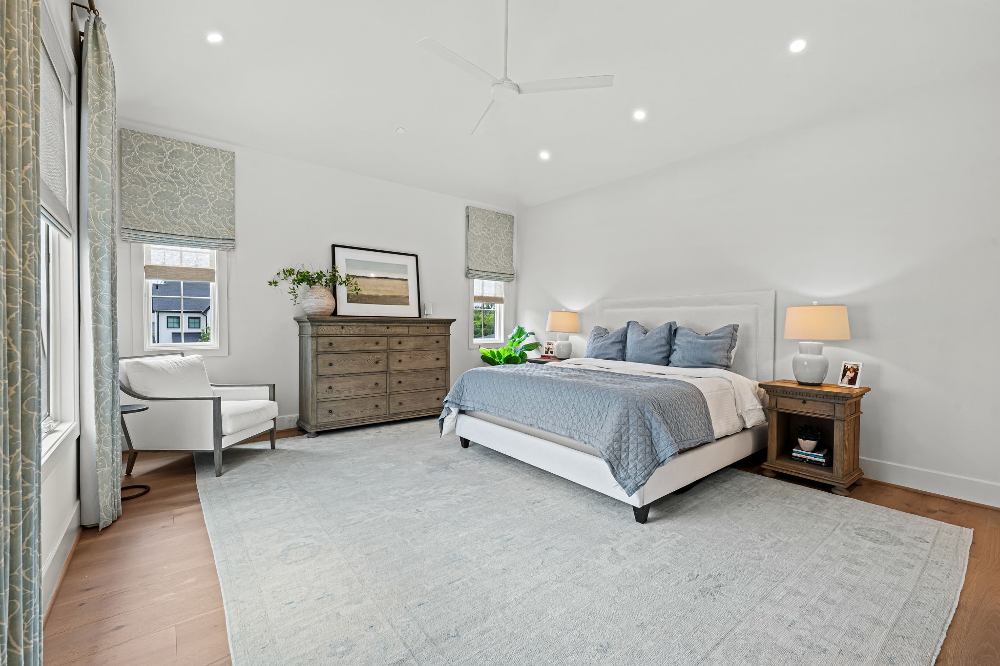 8722 Lupton Lane Houston, TX 77055 - Photo 26 of 44 a bedroom with a bed and furniture