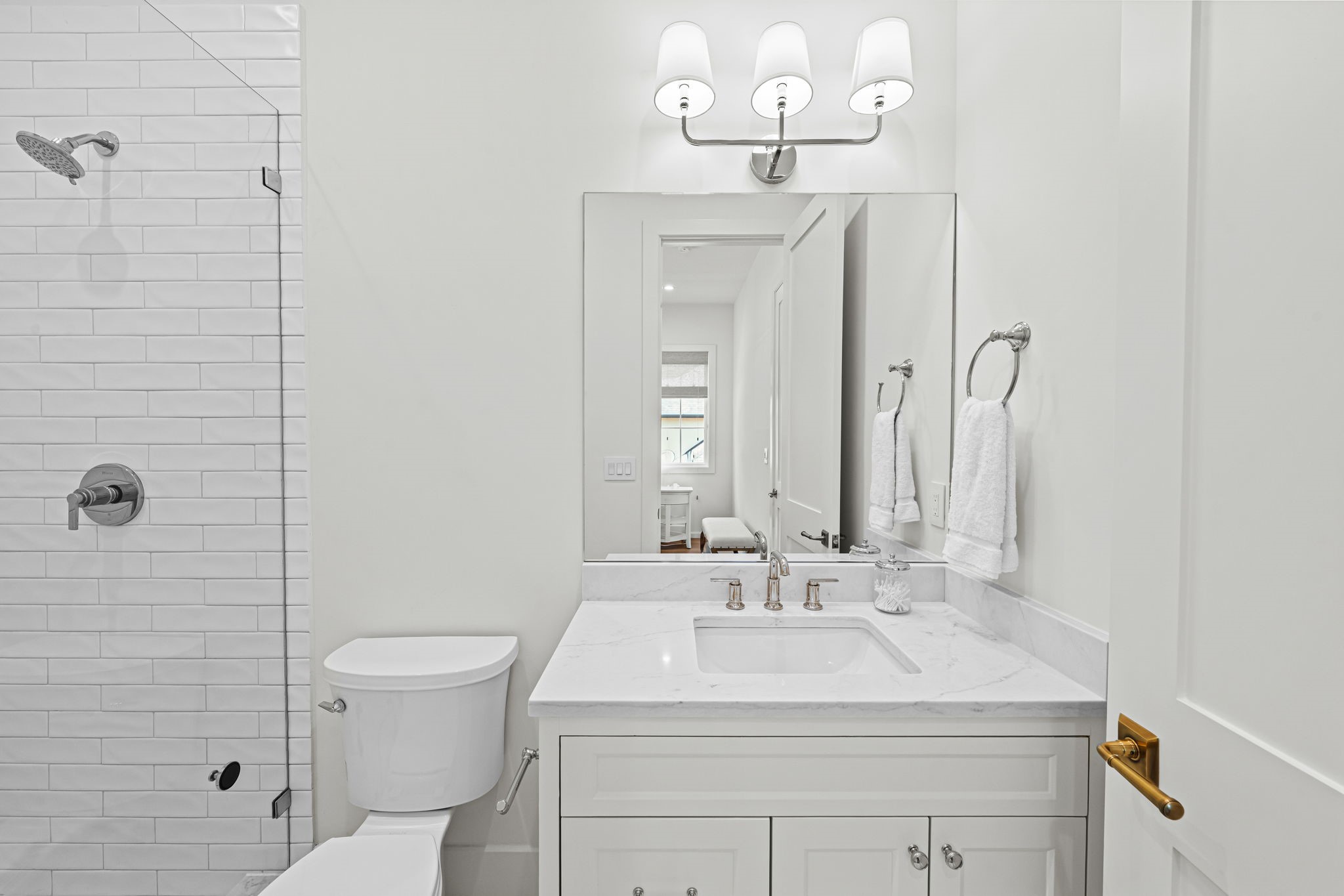 8722 Lupton Lane Houston, TX 77055 - Photo 32 of 44 a bathroom with a sink a toilet and shower