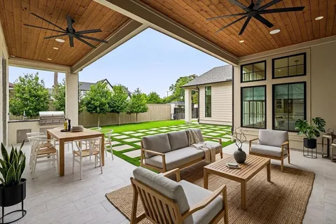 a outdoor living space with furniture and garden view