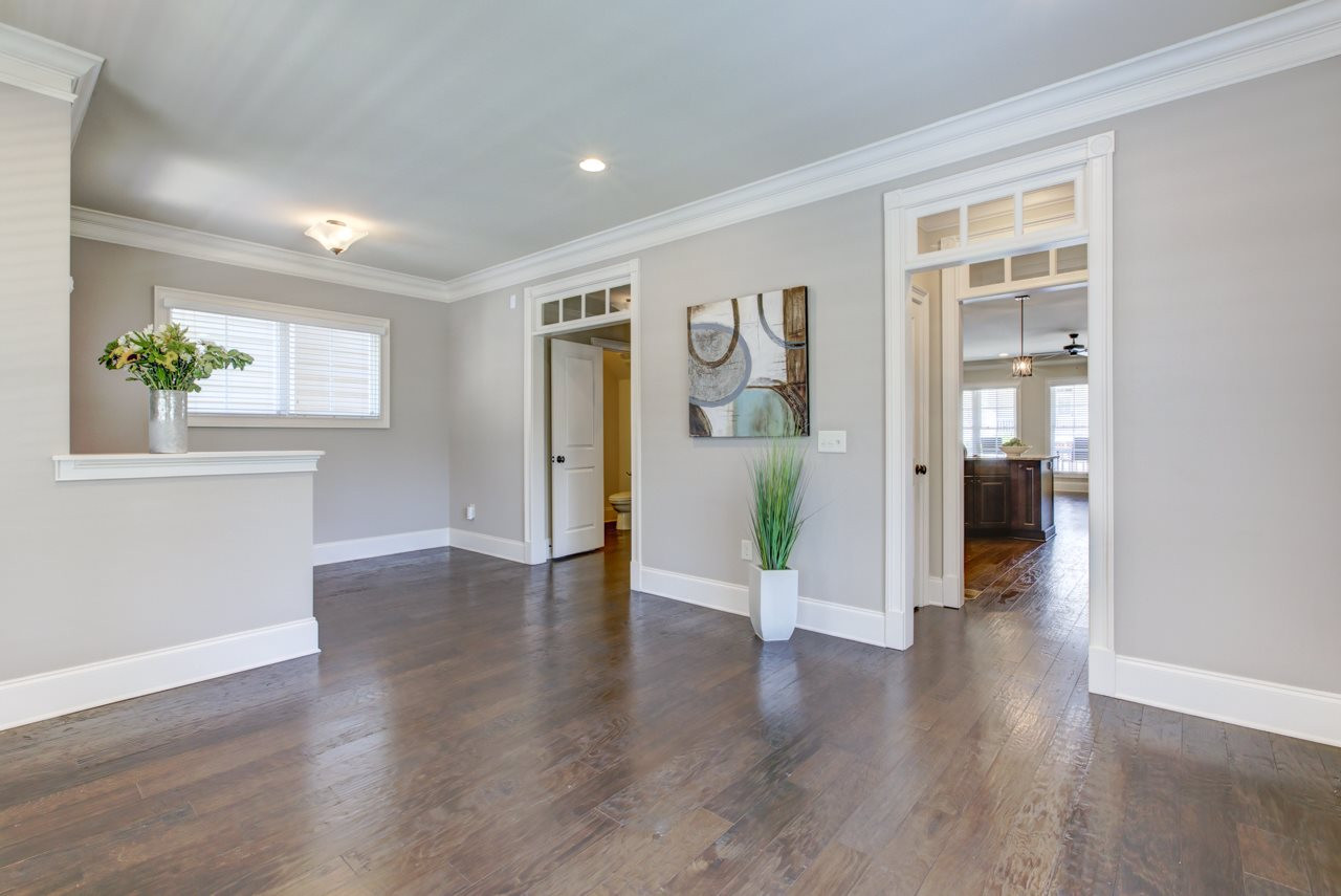 226 Penley Circle Raleigh, NC 27609 - Photo 7 of 14 Another view of the Dining Room shows the access to the Kitchen and Family Room. These bright, open spaces are wonderful for entertaining. Dining Room