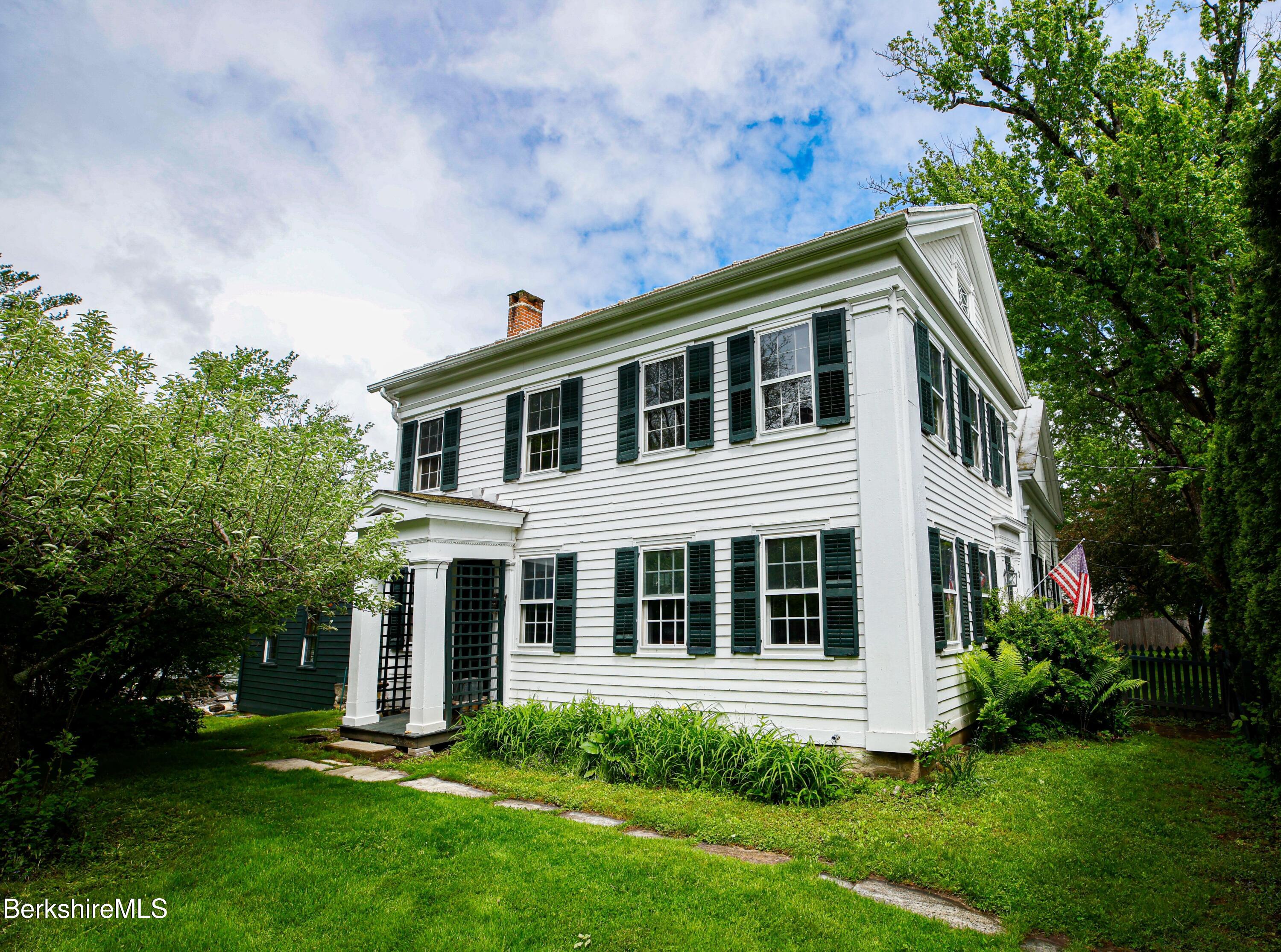 a house view with a garden space