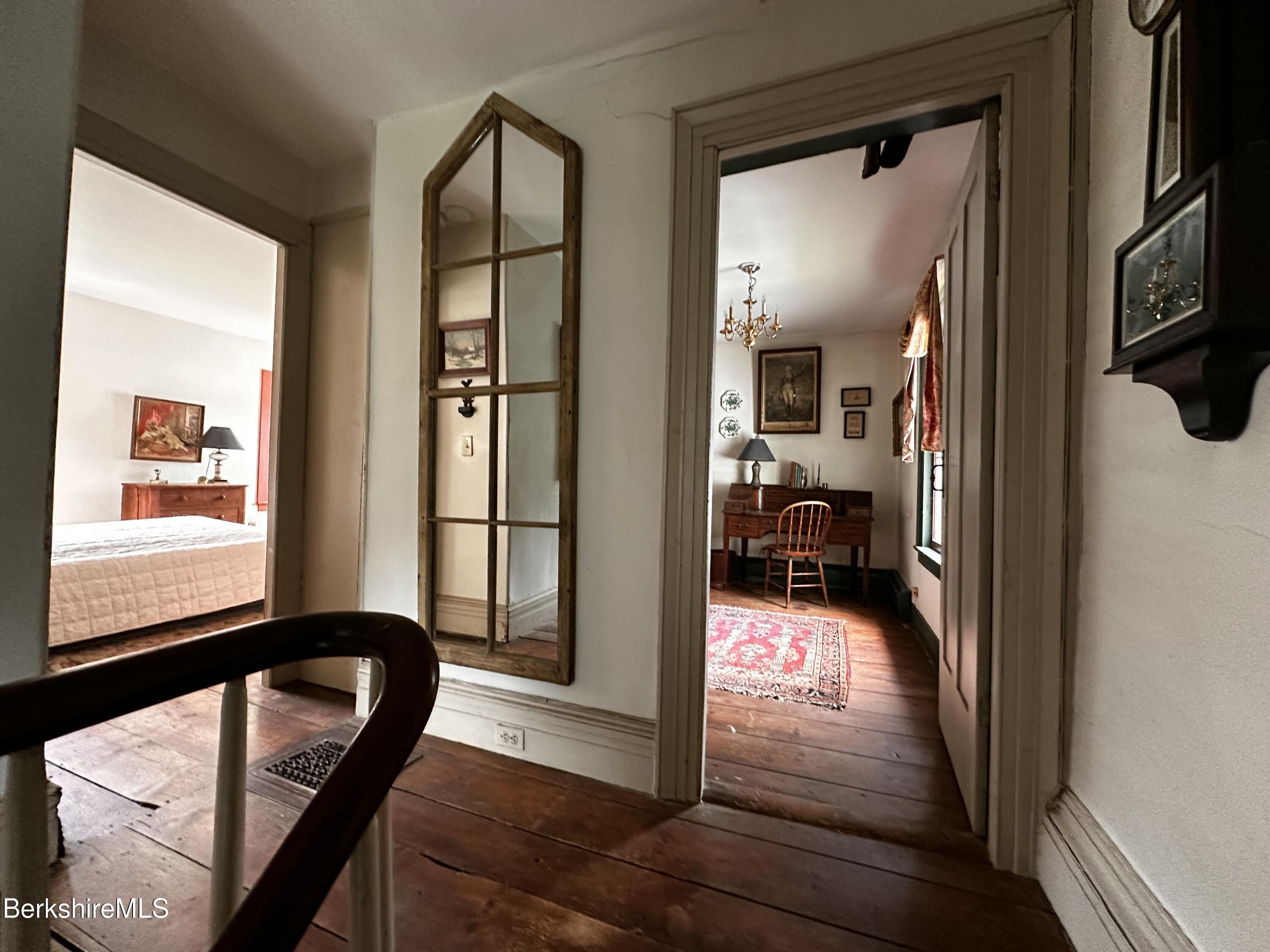 3-5 Swamp Road West Stockbridge, MA 01266 - Photo 15 of 37 a view of a hallway with wooden floor and windows