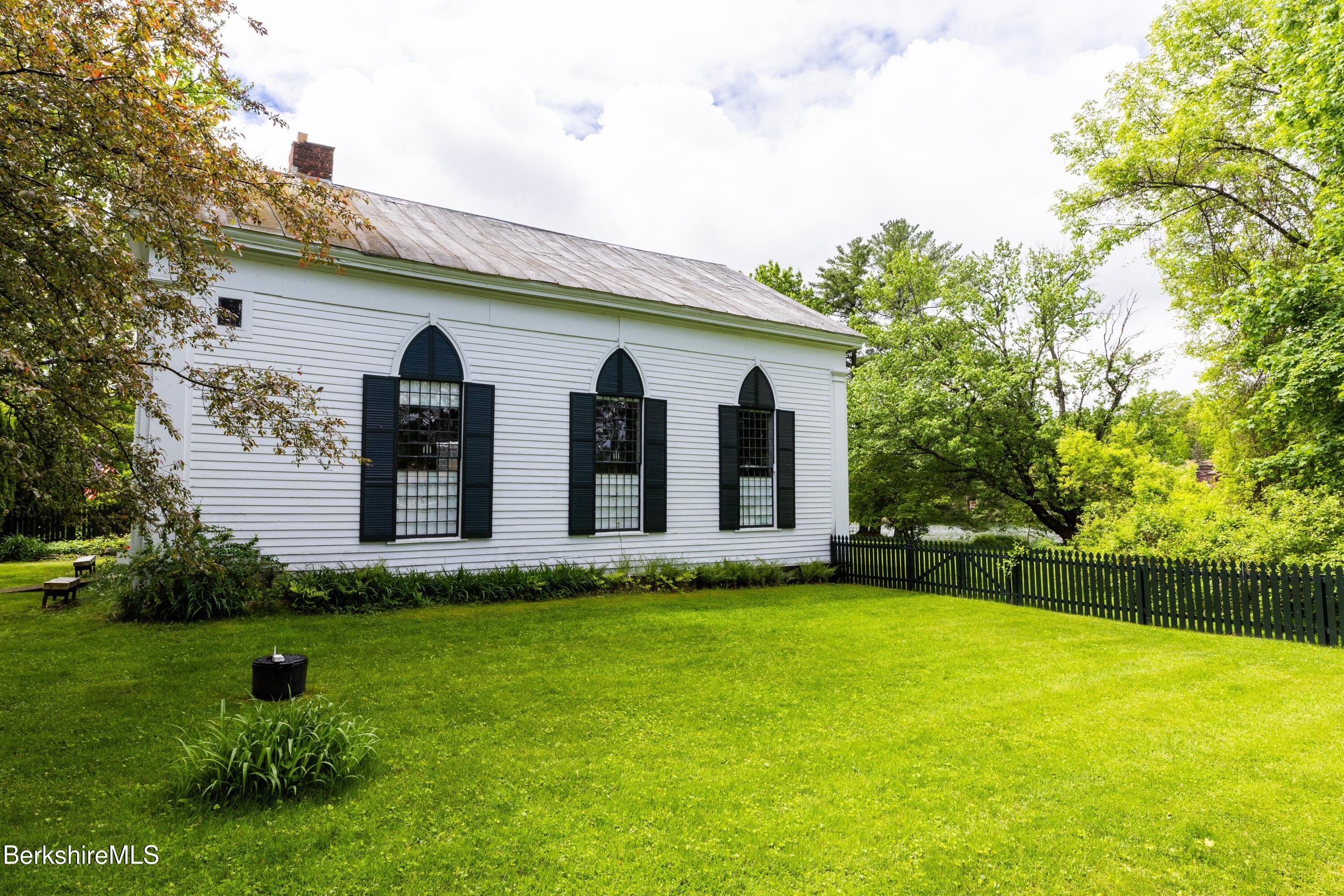 3-5 Swamp Road West Stockbridge, MA 01266 - Photo 20 of 37 a view of a house with backyard and garden