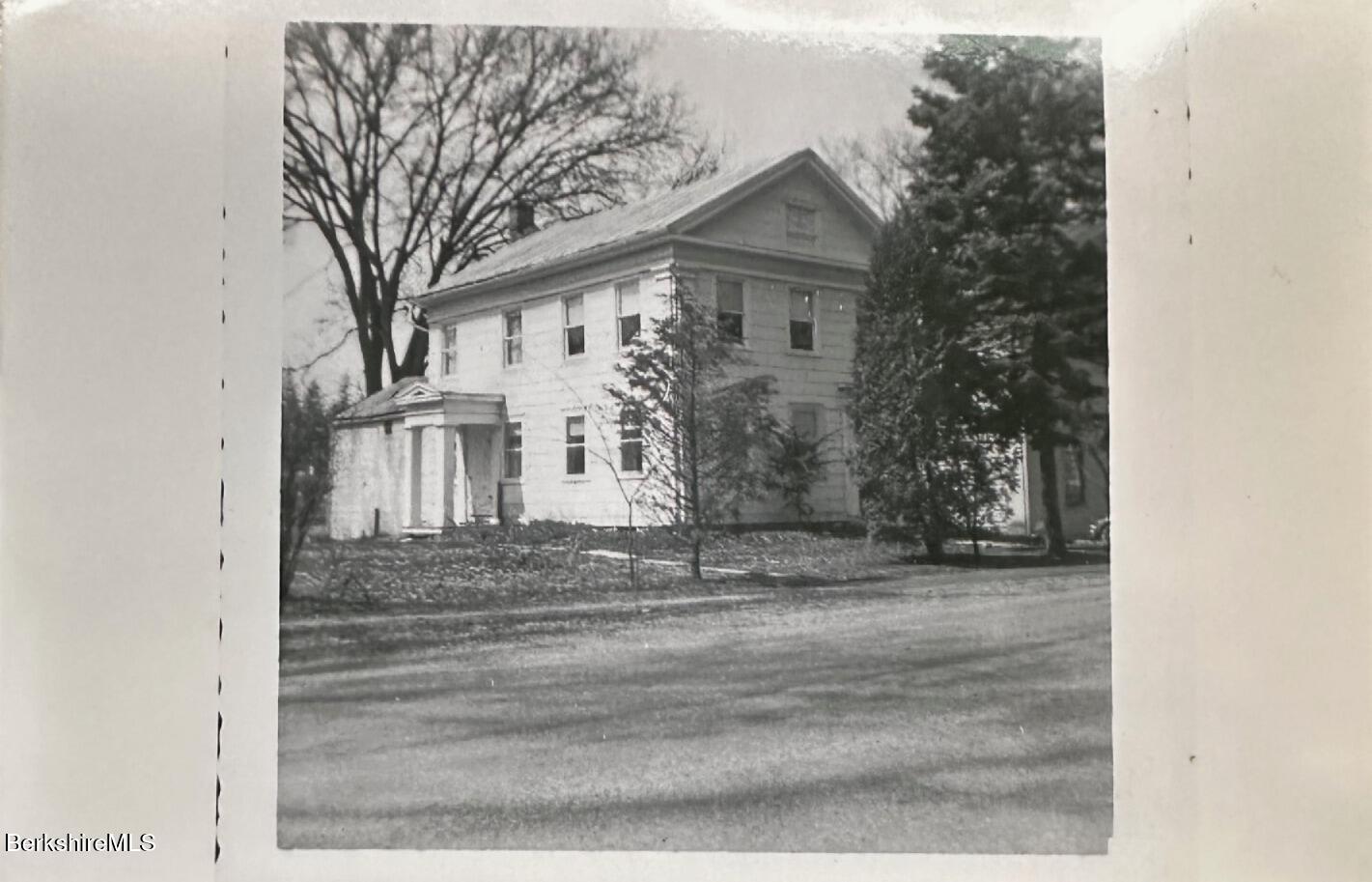 3-5 Swamp Road West Stockbridge, MA 01266 - Photo 32 of 37 a view of a house with a yard