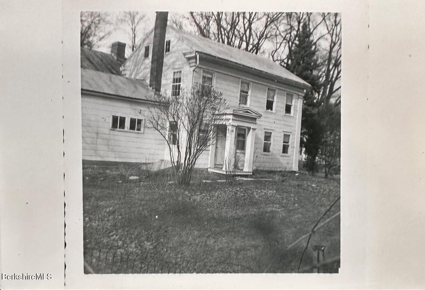 3-5 Swamp Road West Stockbridge, MA 01266 - Photo 33 of 37 a view of a white house with large windows