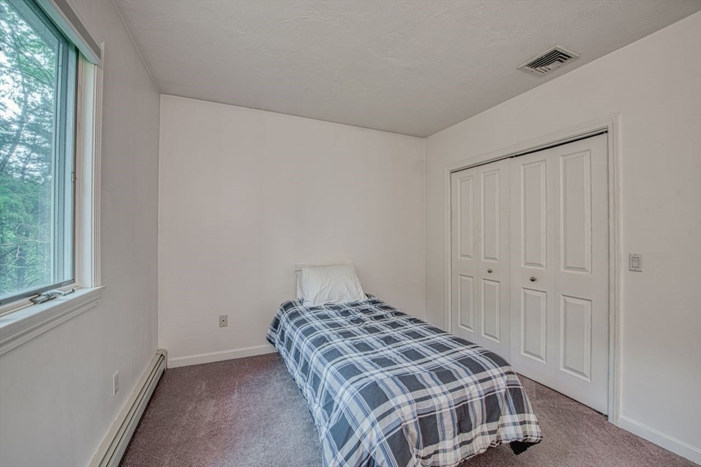 7 Tisdale Road Sharon, MA 02067 - Photo 22 of 37 a bedroom with a bed and window