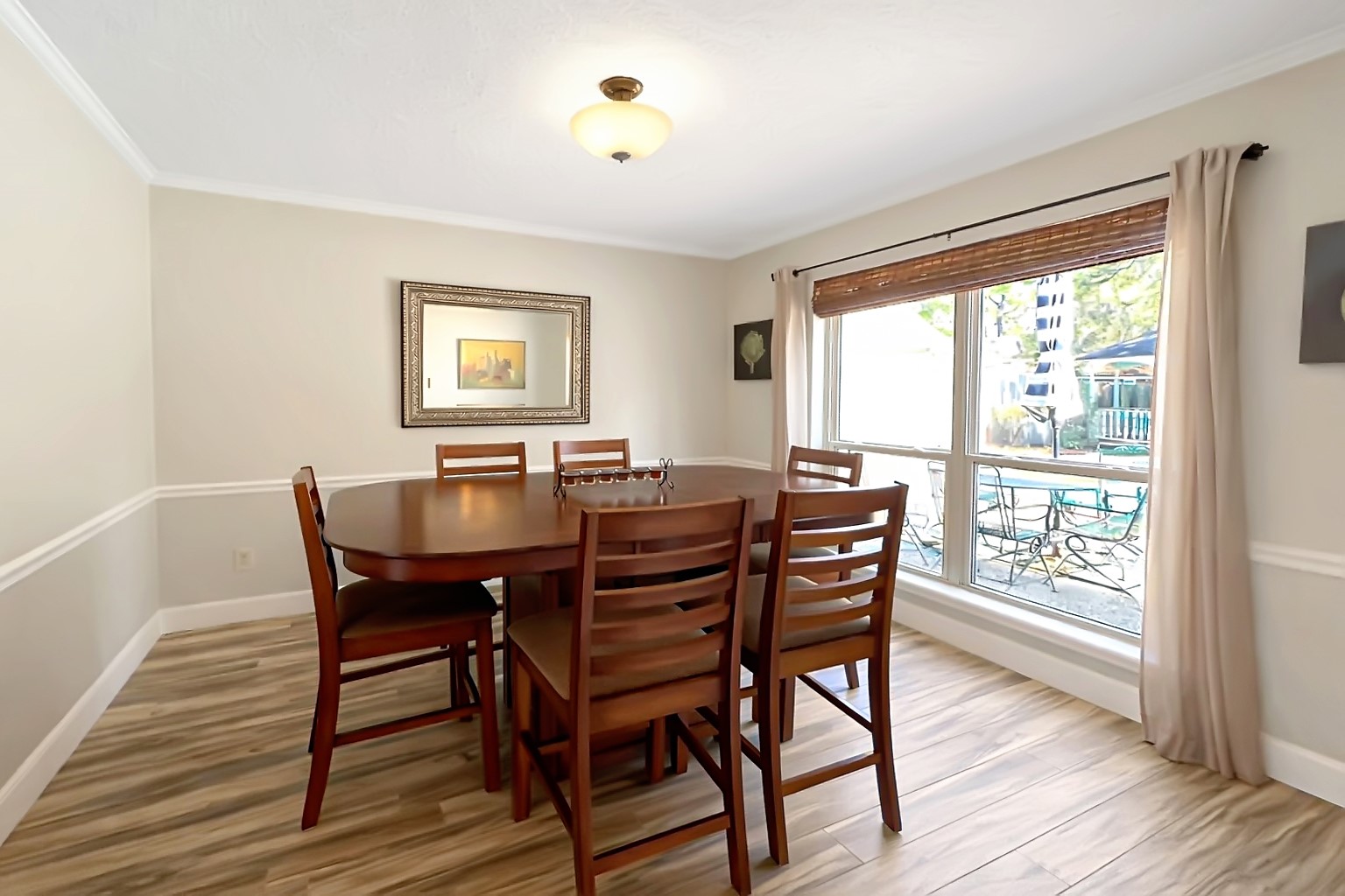 17418 Spicewood Springs Lane Spring, TX 77379 - Photo 11 of 50 a view of a dining room with furniture window and wooden floor
