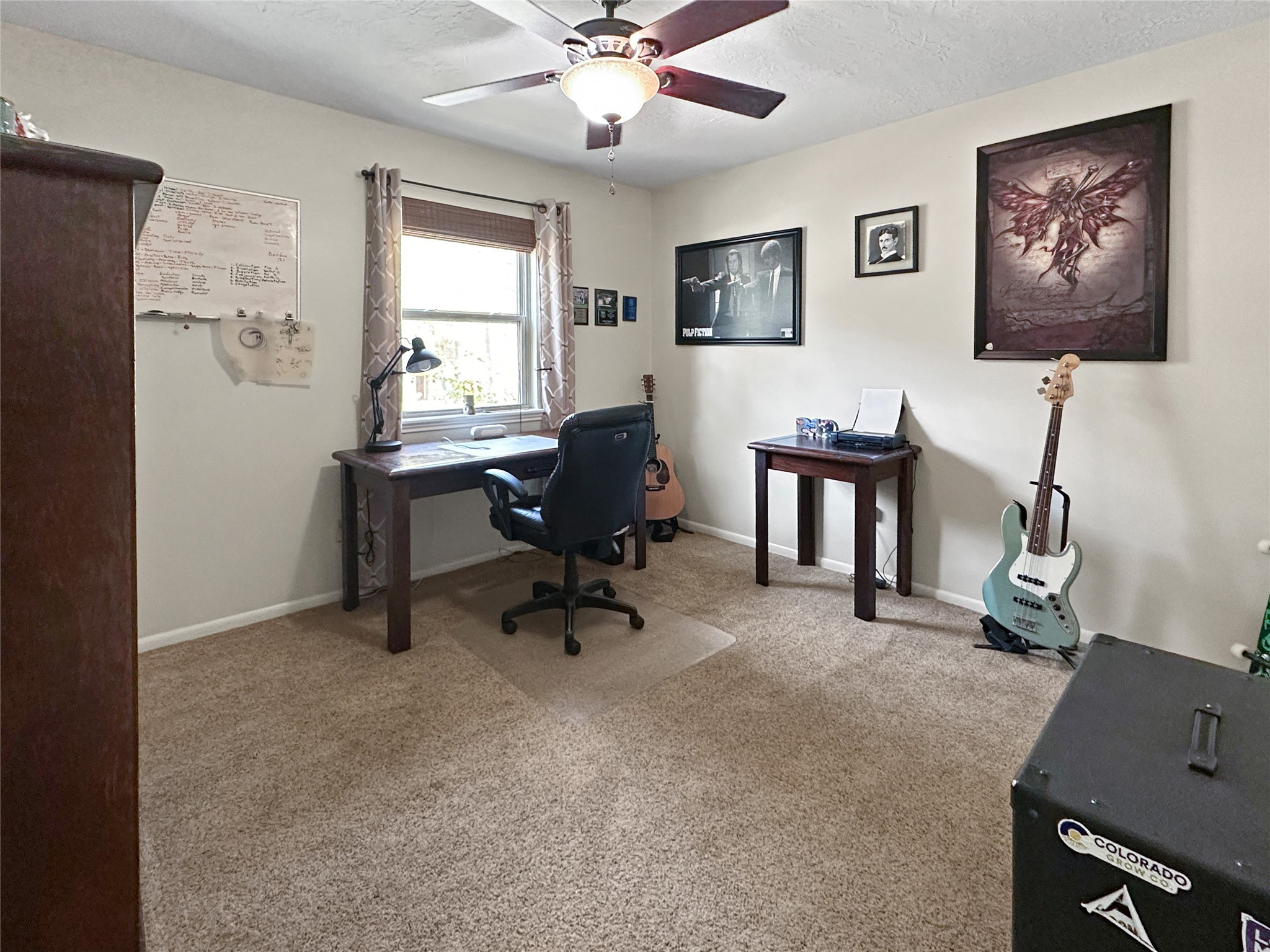17418 Spicewood Springs Lane Spring, TX 77379 - Photo 17 of 50 a view of a workspace with furniture and a window
