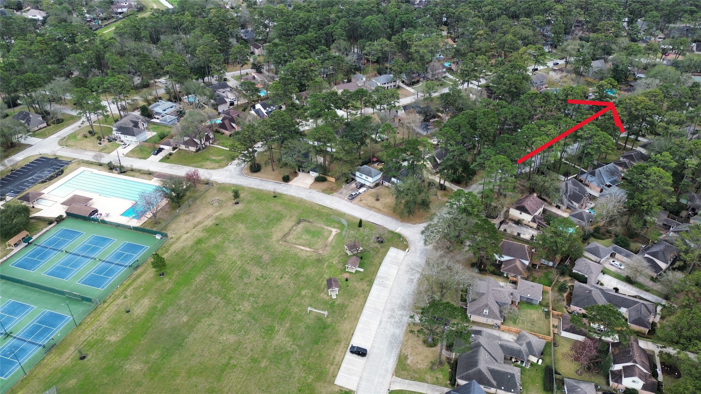 17418 Spicewood Springs Lane Spring, TX 77379 - Photo 27 of 50 an aerial view of residential houses with outdoor space