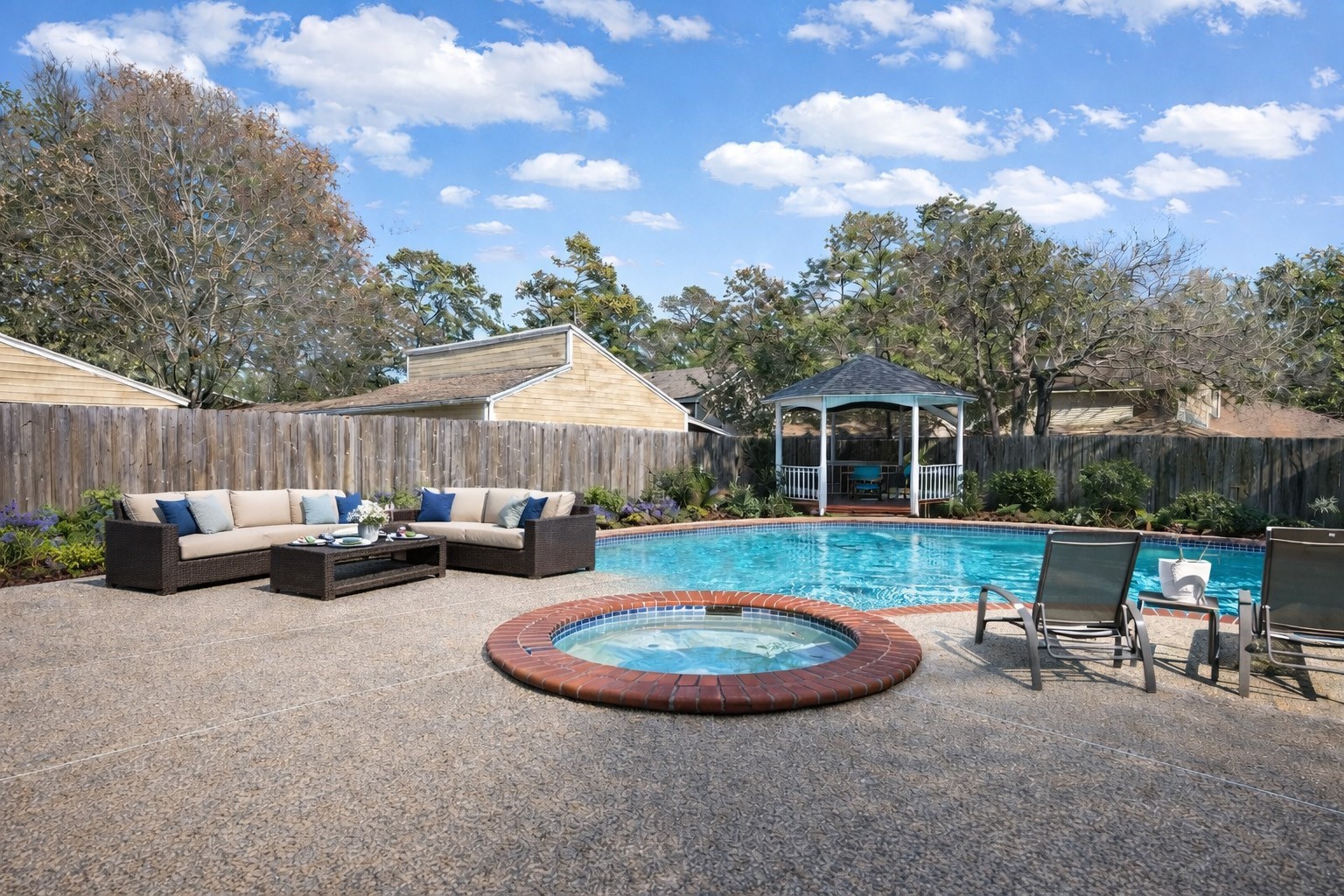 17418 Spicewood Springs Lane Spring, TX 77379 - Photo 3 of 50 a view of a backyard with furniture and a fire pit