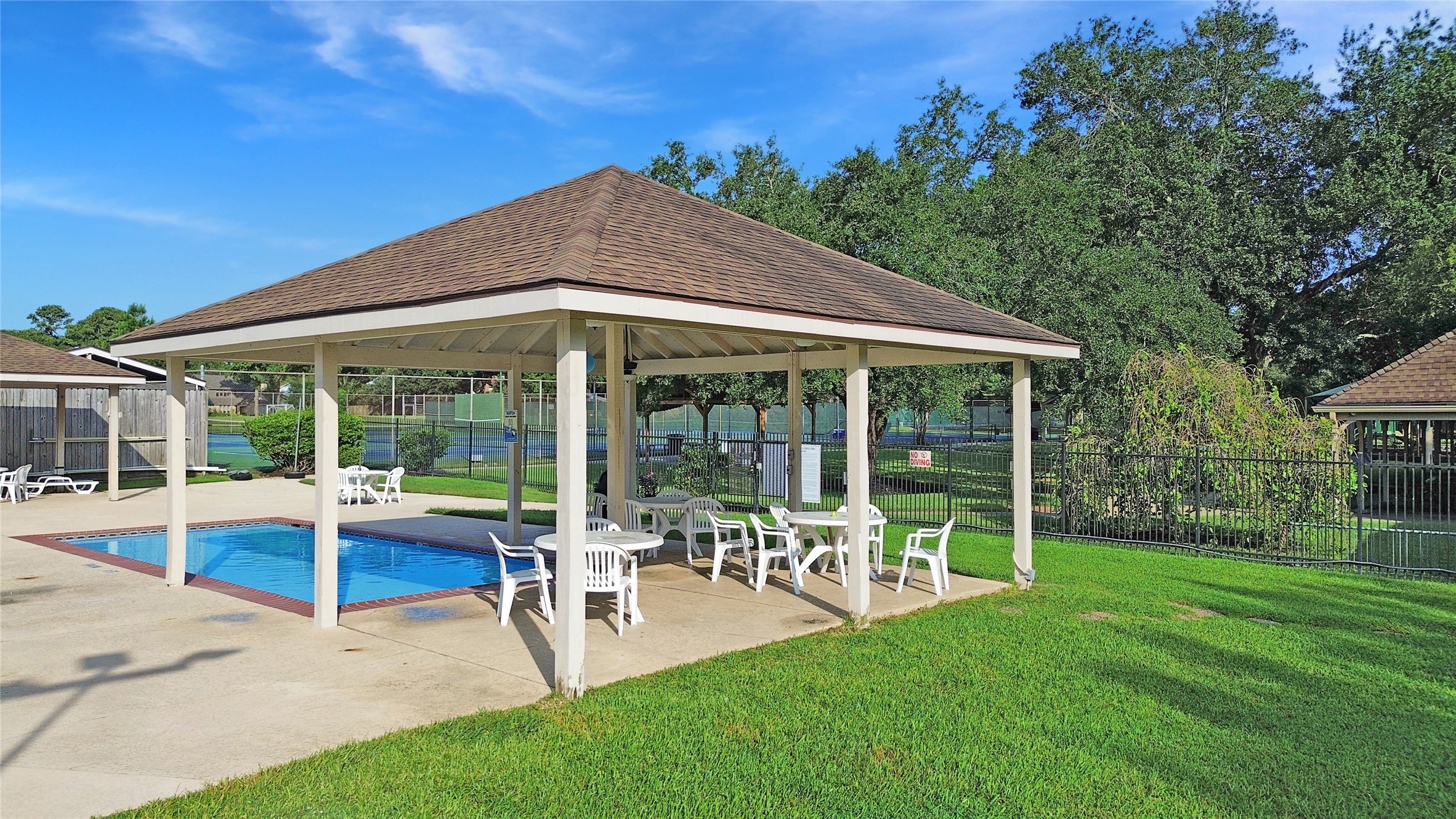 17418 Spicewood Springs Lane Spring, TX 77379 - Photo 42 of 50 a view of a house with backyard porch and sitting area
