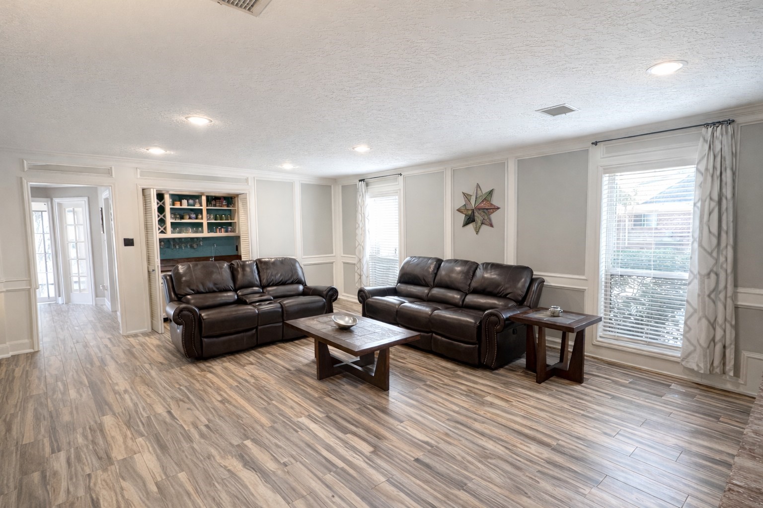 17418 Spicewood Springs Lane Spring, TX 77379 - Photo 6 of 50 a living room with furniture and a wooden floor