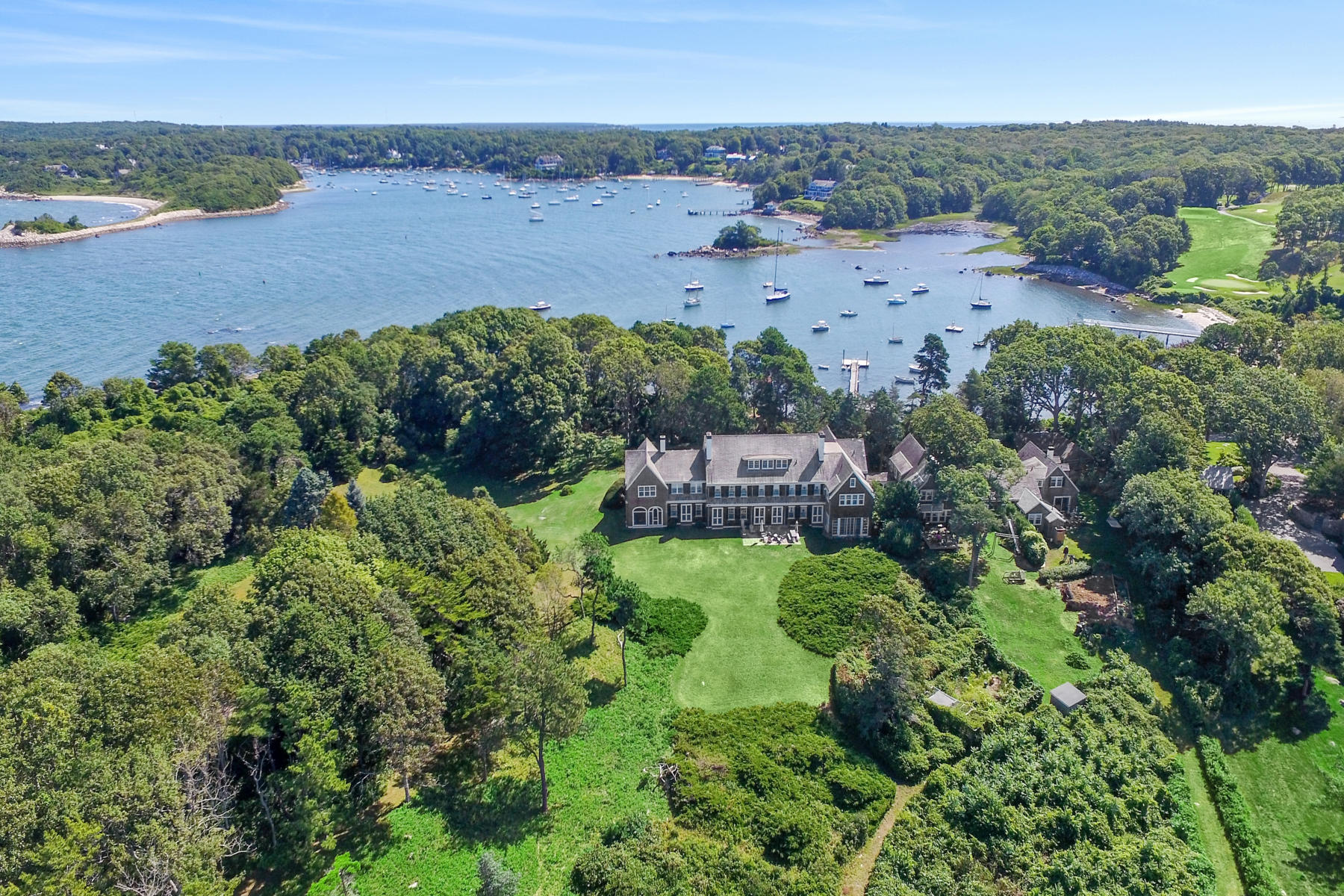188 Gansett Road Woods Hole, MA 02543 - Photo 1 of 26 an aerial view of a houses with a yard