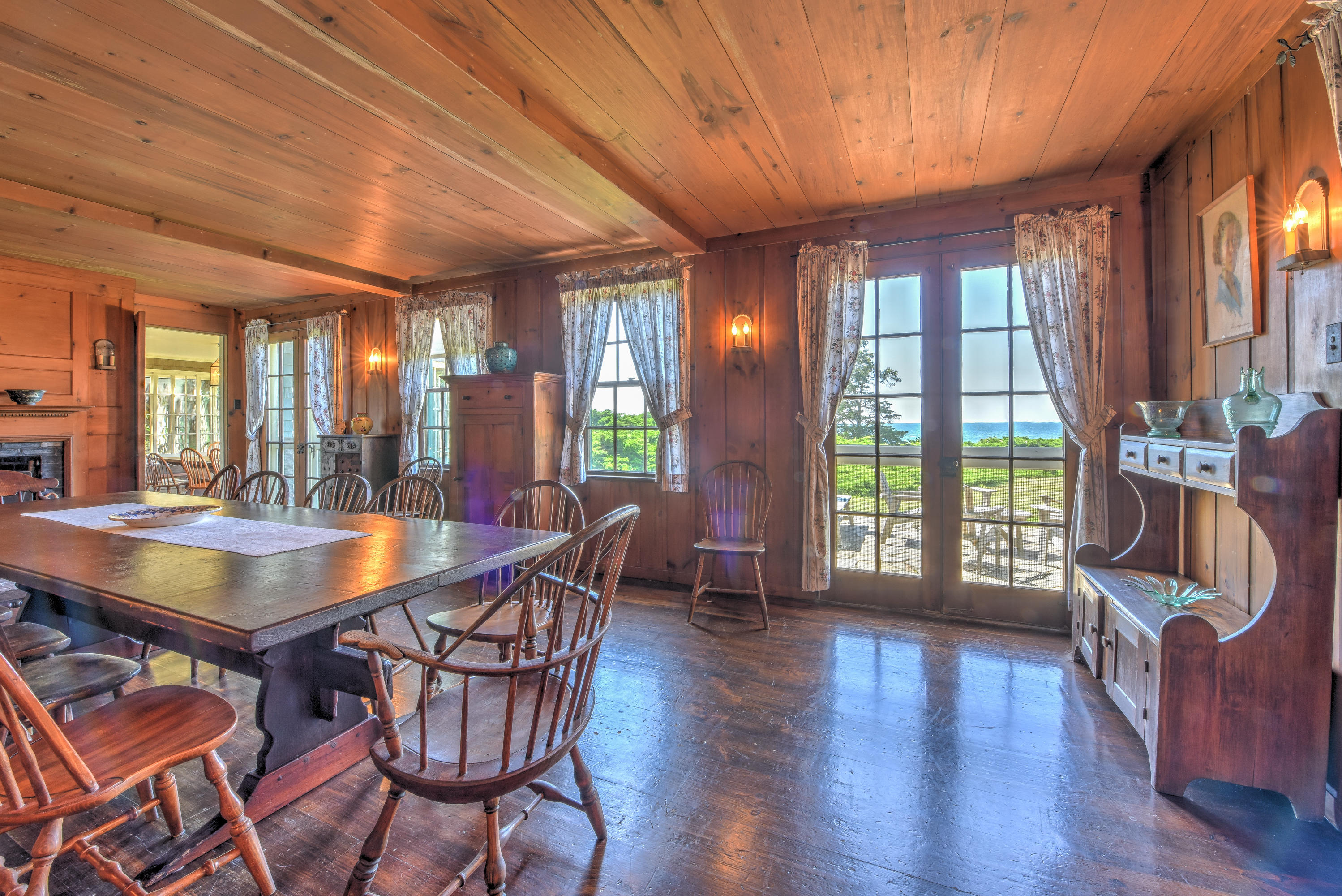 188 Gansett Road Woods Hole, MA 02543 - Photo 11 of 26 a dining room with furniture window wooden floor