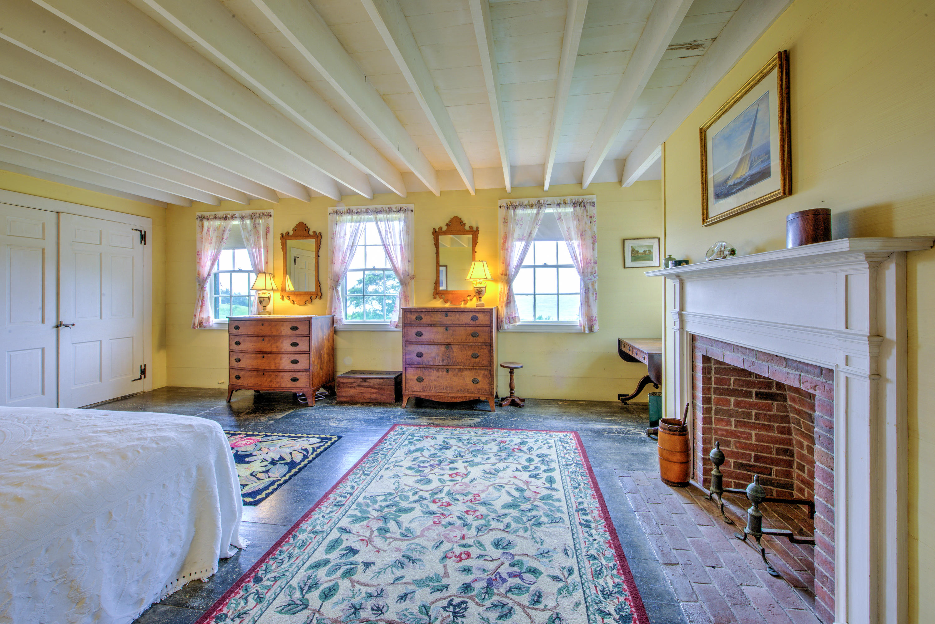 188 Gansett Road Woods Hole, MA 02543 - Photo 17 of 26 a living room with furniture and a fireplace