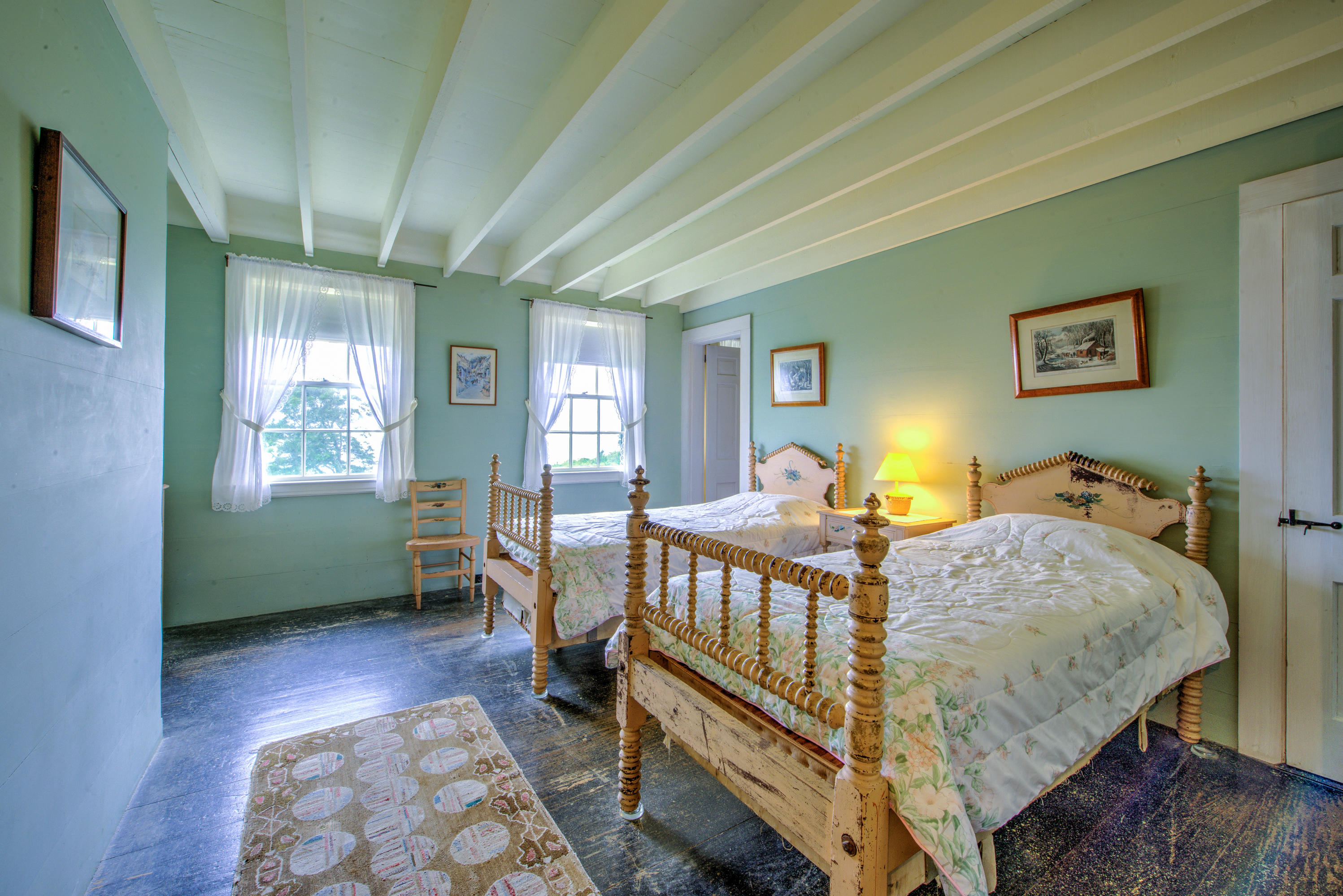 188 Gansett Road Woods Hole, MA 02543 - Photo 18 of 26 a bed room with furniture and a window