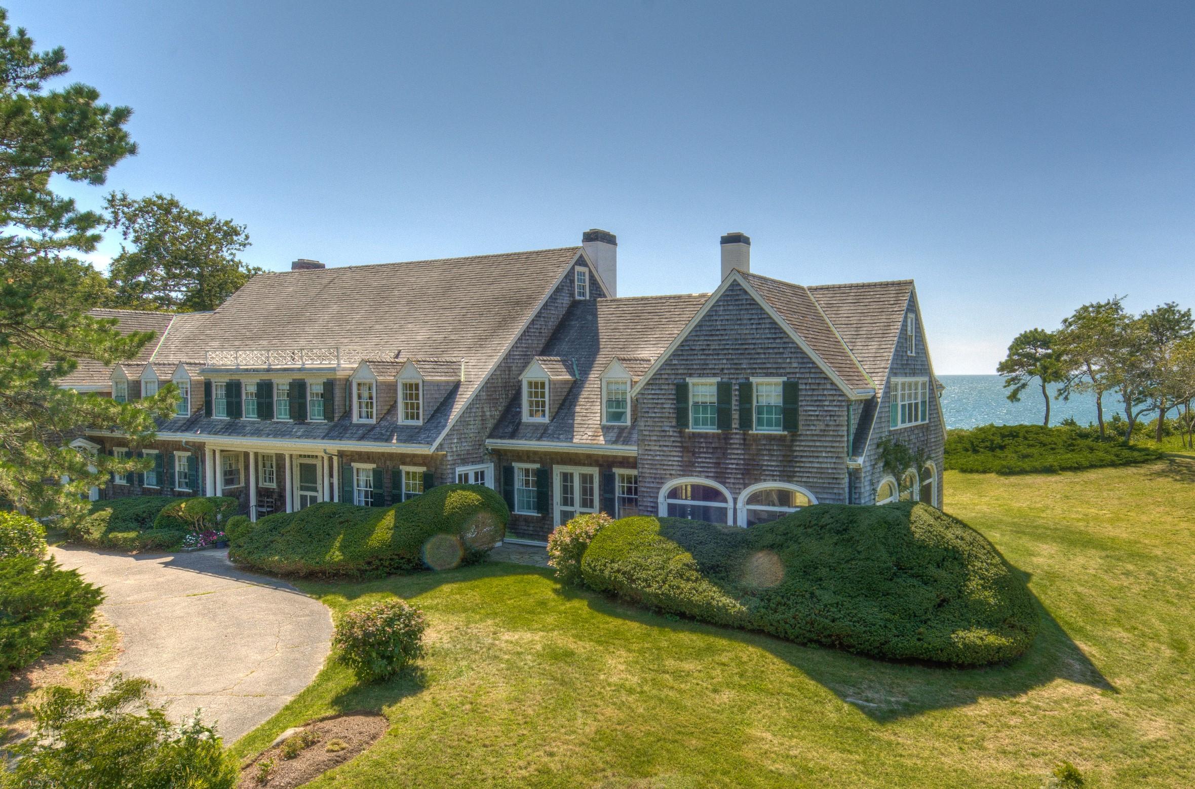 188 Gansett Road Woods Hole, MA 02543 - Photo 2 of 26 a front view of a house with a yard