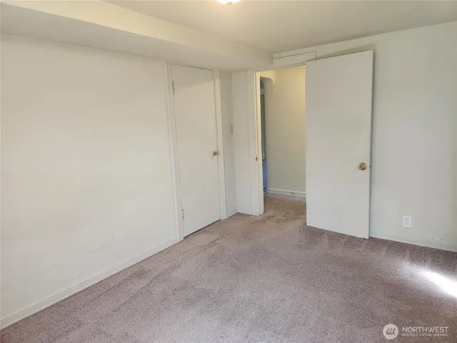 an empty room with closet