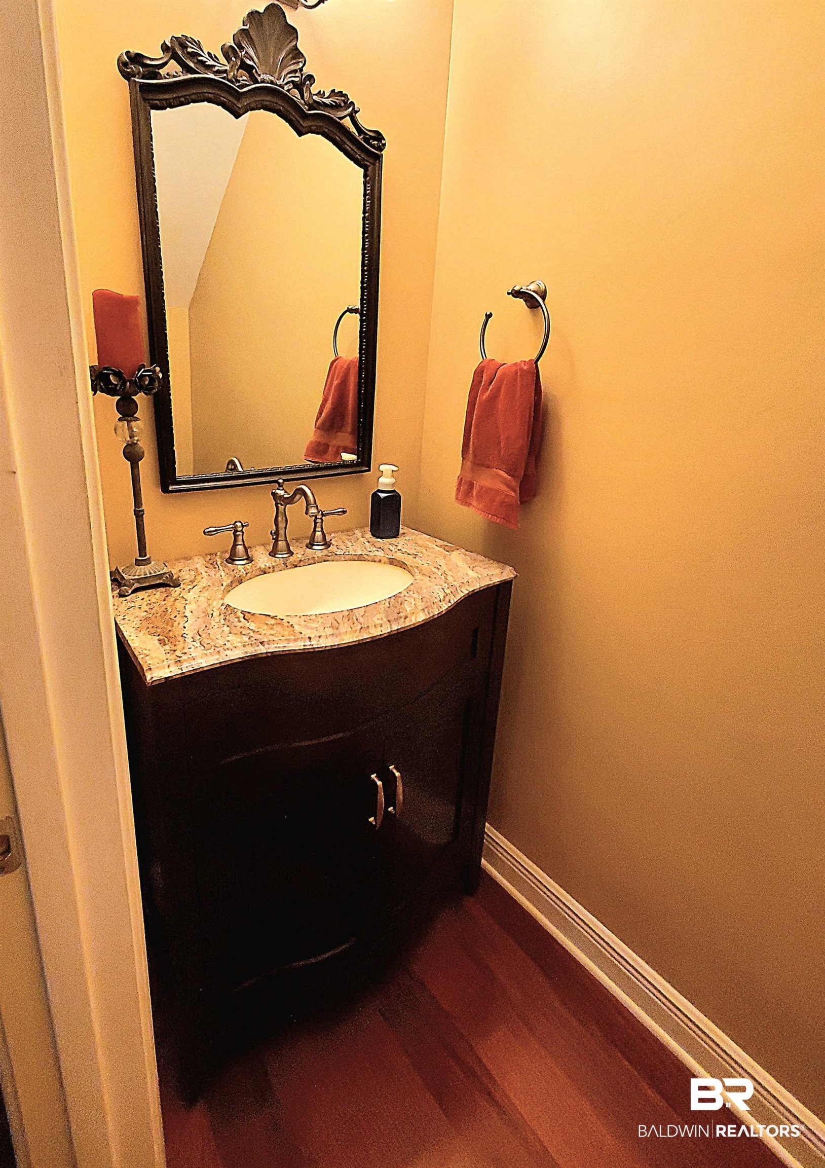 31163 Woodland Way Daphne, AL 36527 - Photo 8 of 44 Bathroom with hardwood / wood-style flooring and vanity