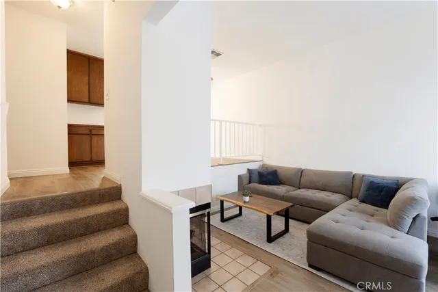 a living room with furniture and a couch