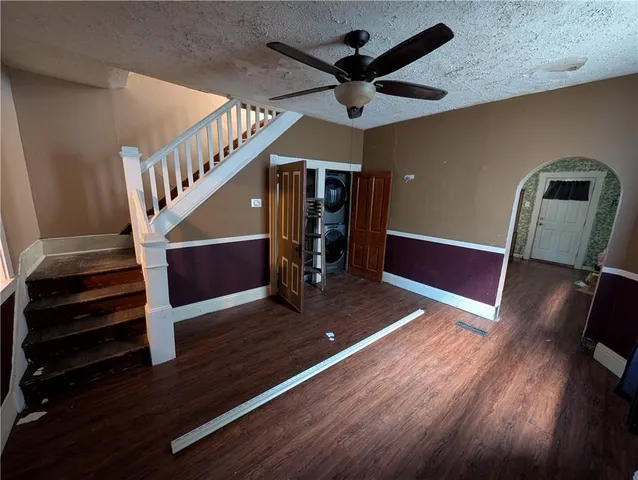 a view of entryway with wooden floor
