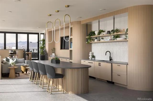 a kitchen with stainless steel appliances a sink and cabinets