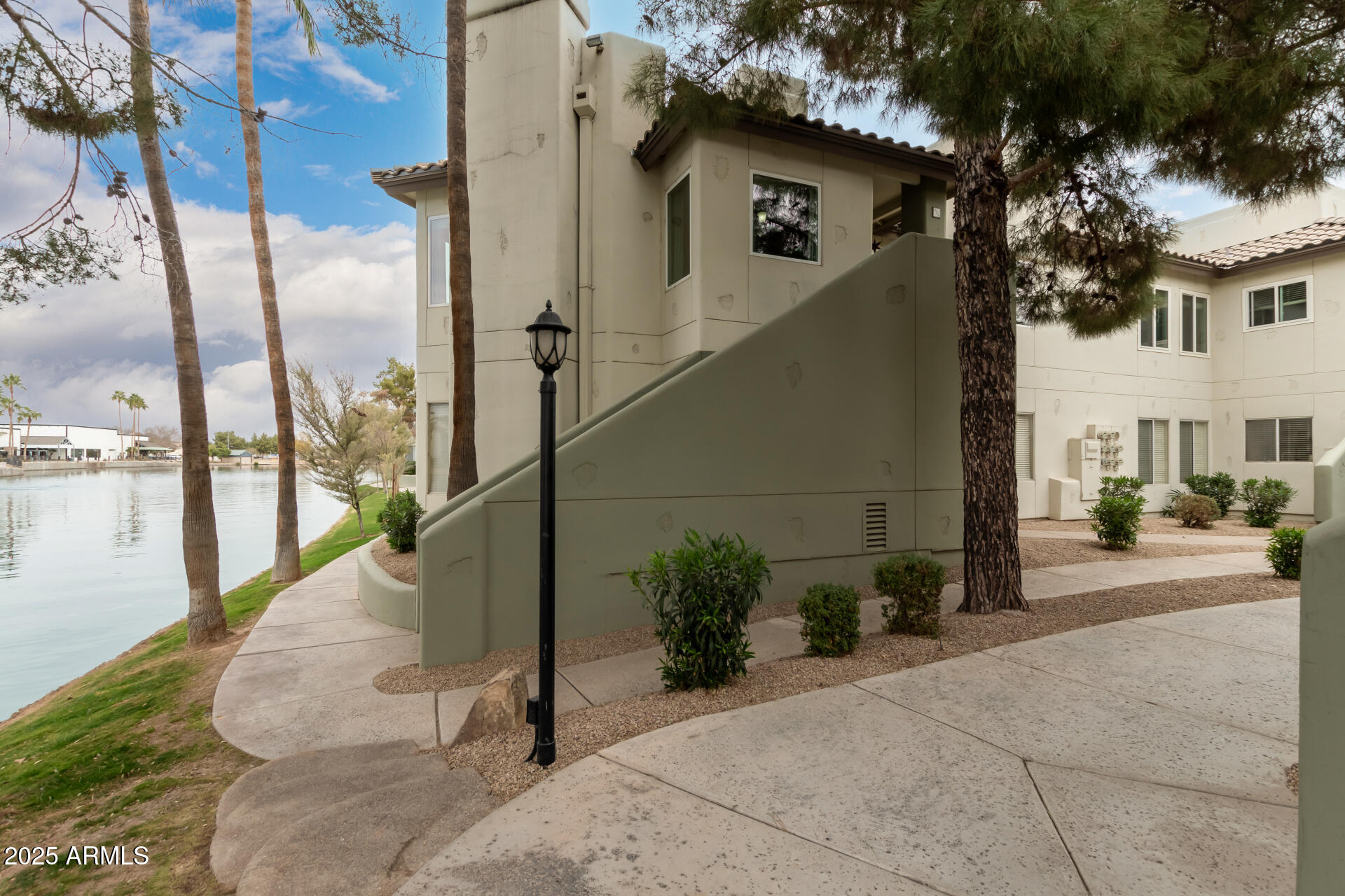 1825 West Ray Road, Unit 2116 Chandler, AZ 85224 - Photo 1 of 44 a view of a house with backyard